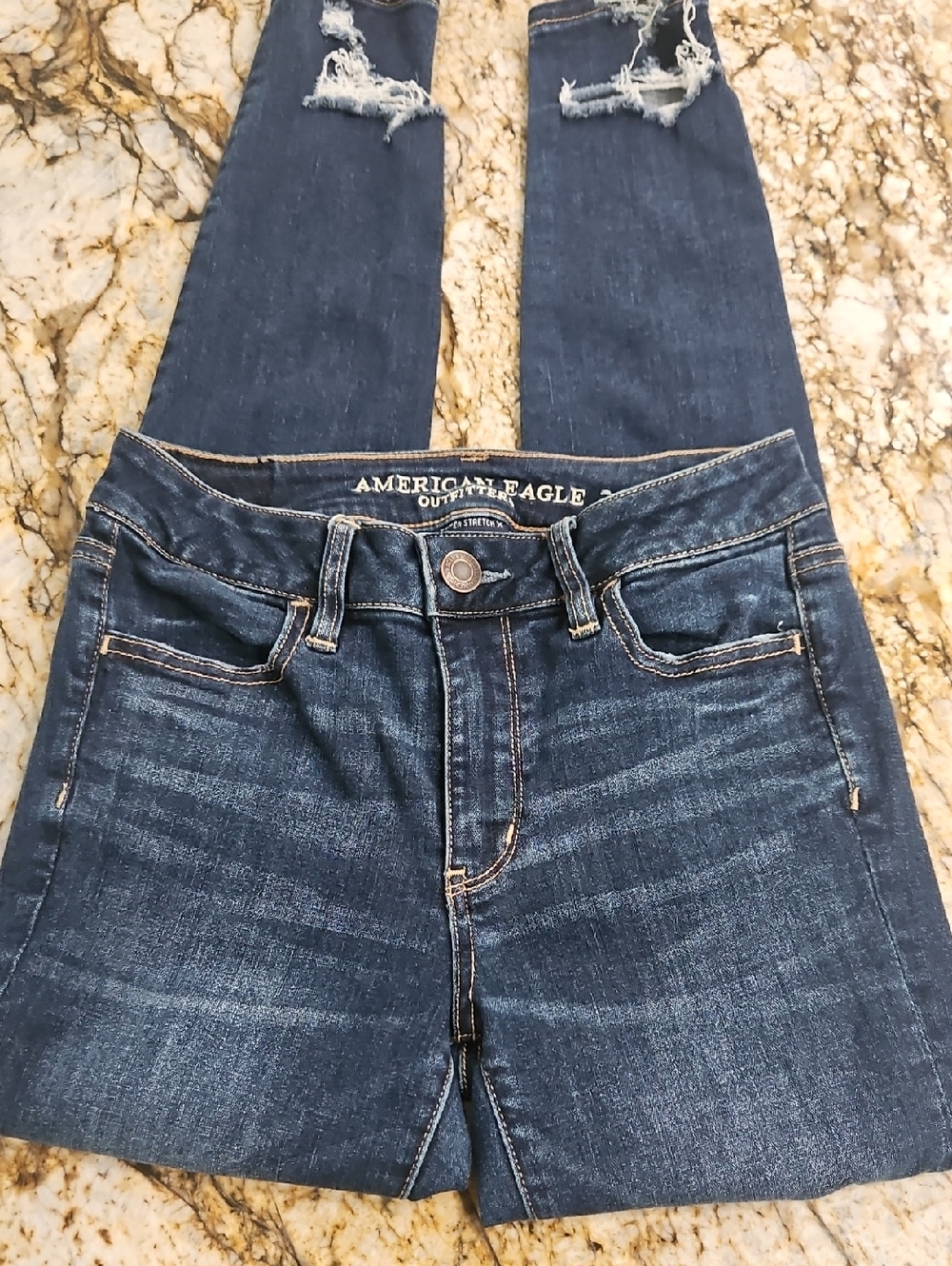 American Eagle Outfitters Women's Medium Blue Ripped Skinny. Size 4. Inseam 29"